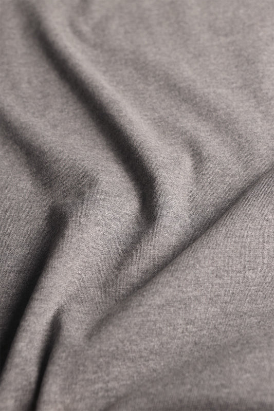 Versatile rib knit textile in sports grey, ideal for crafting fitted garments and accessories.