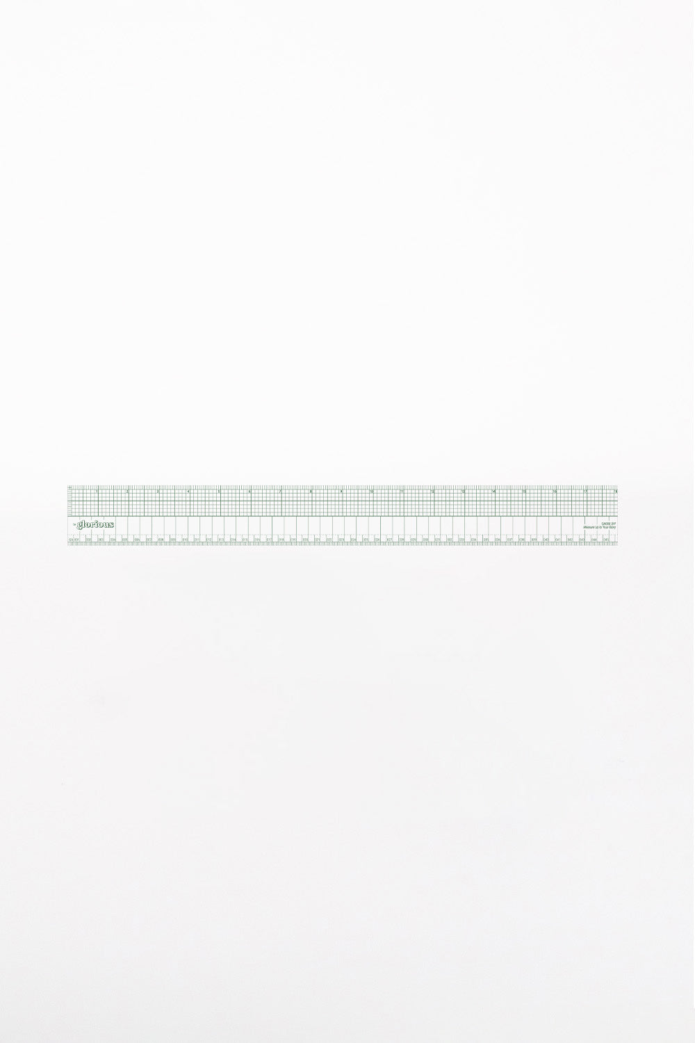 18" transparent ruler with imperial and metric unit markings in a fern green color.